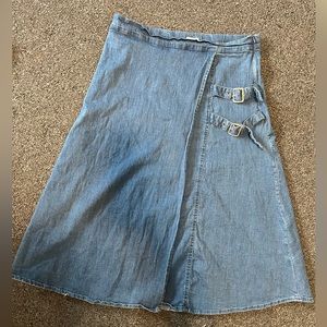 Girl’s denim colored knee length skirt. Size 16.